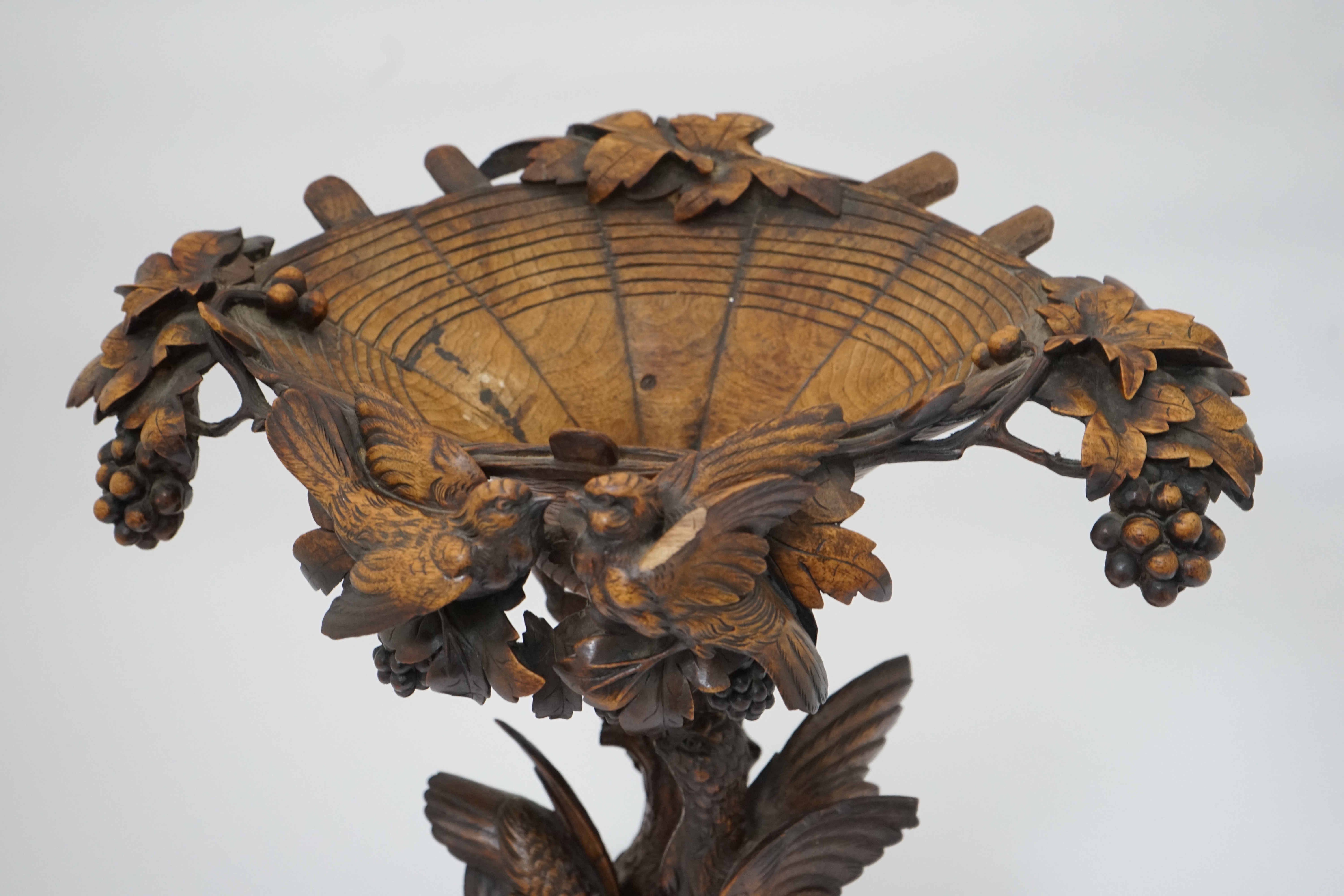 A 19th century Black Forest carved wood centrepiece